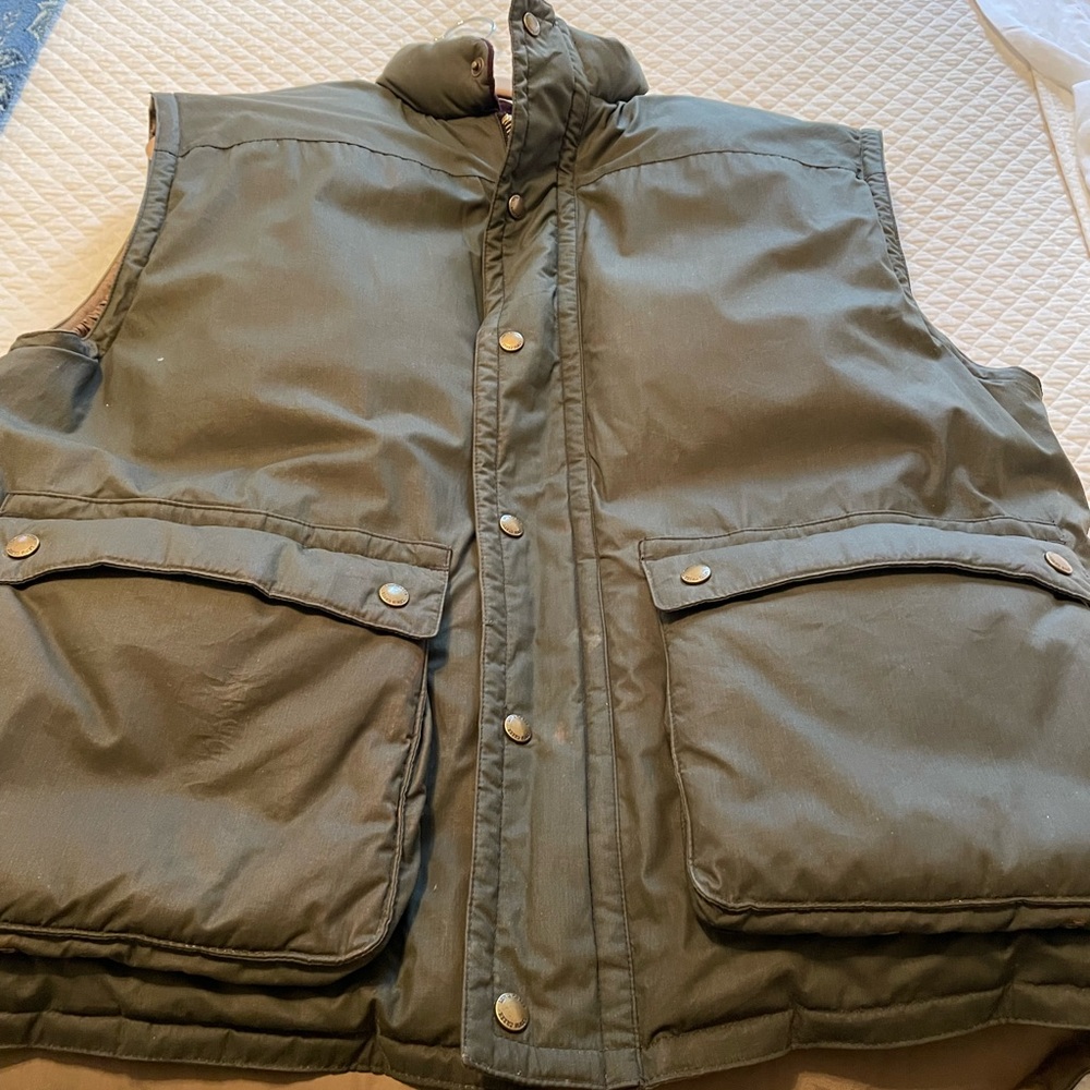 Lewis Creek wax Scottish fabric olive green vest.
Goose down  size Large Men’s